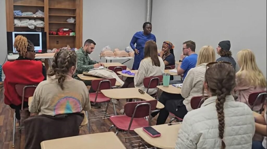 a woman instructing a cpr class